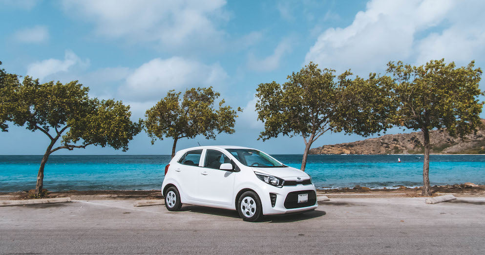 White Kia Picanto rented with 2 rentcuracao in curaçao
